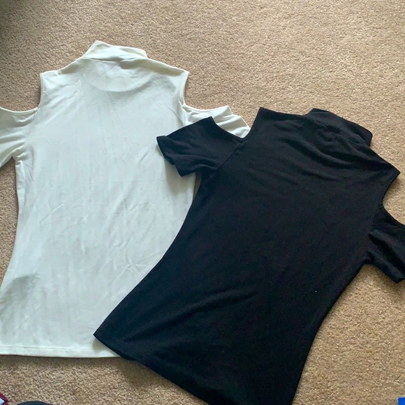 White and black turtlenecks w/ shoulder cut outs - Picture 2 of 3